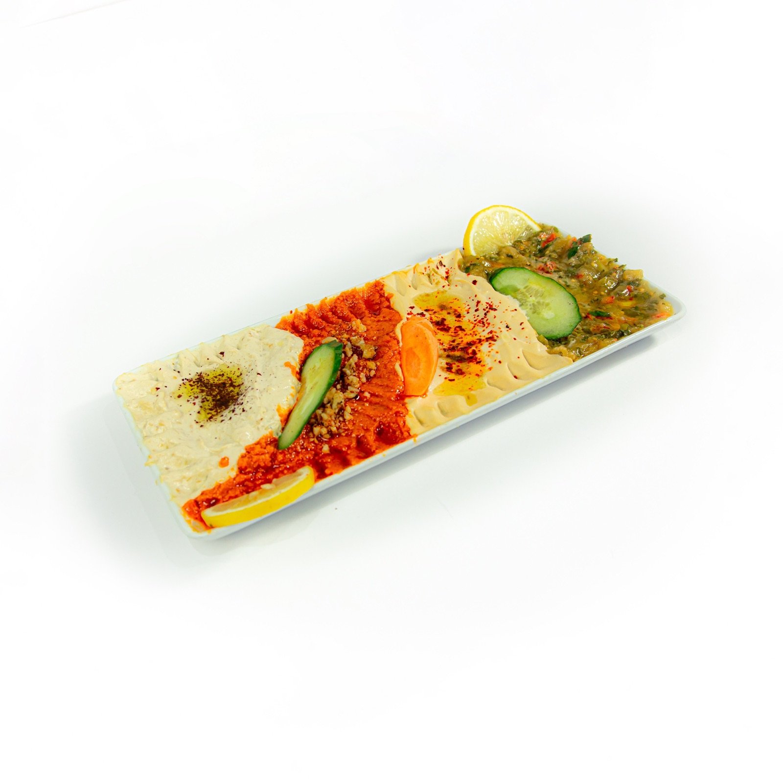 Hummus and dips on a long plate
