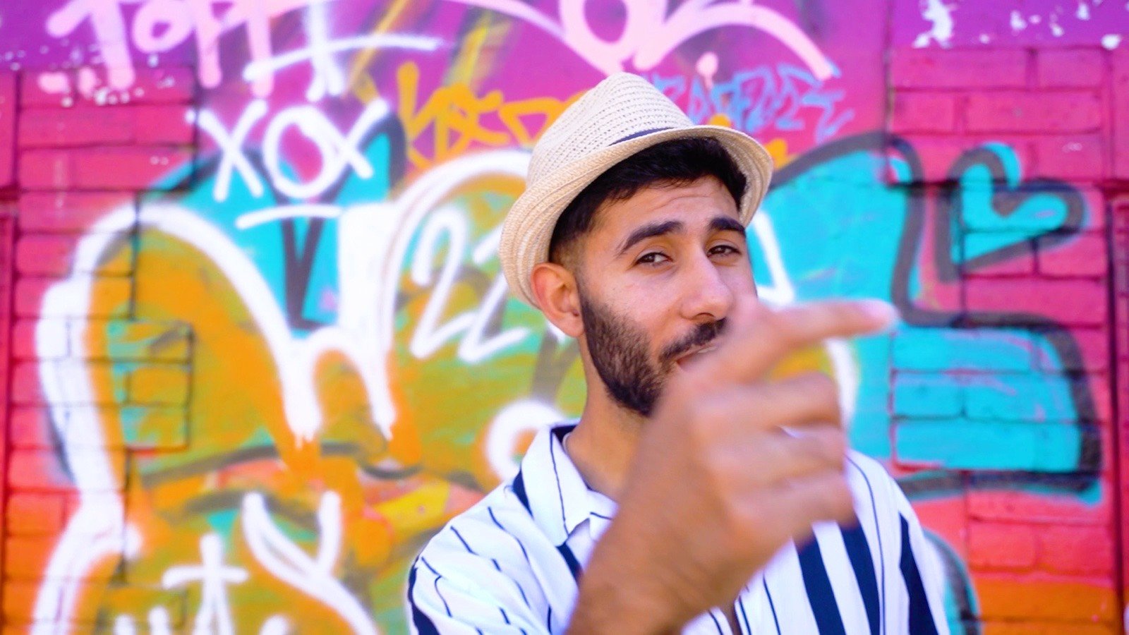 Pointing to the camera