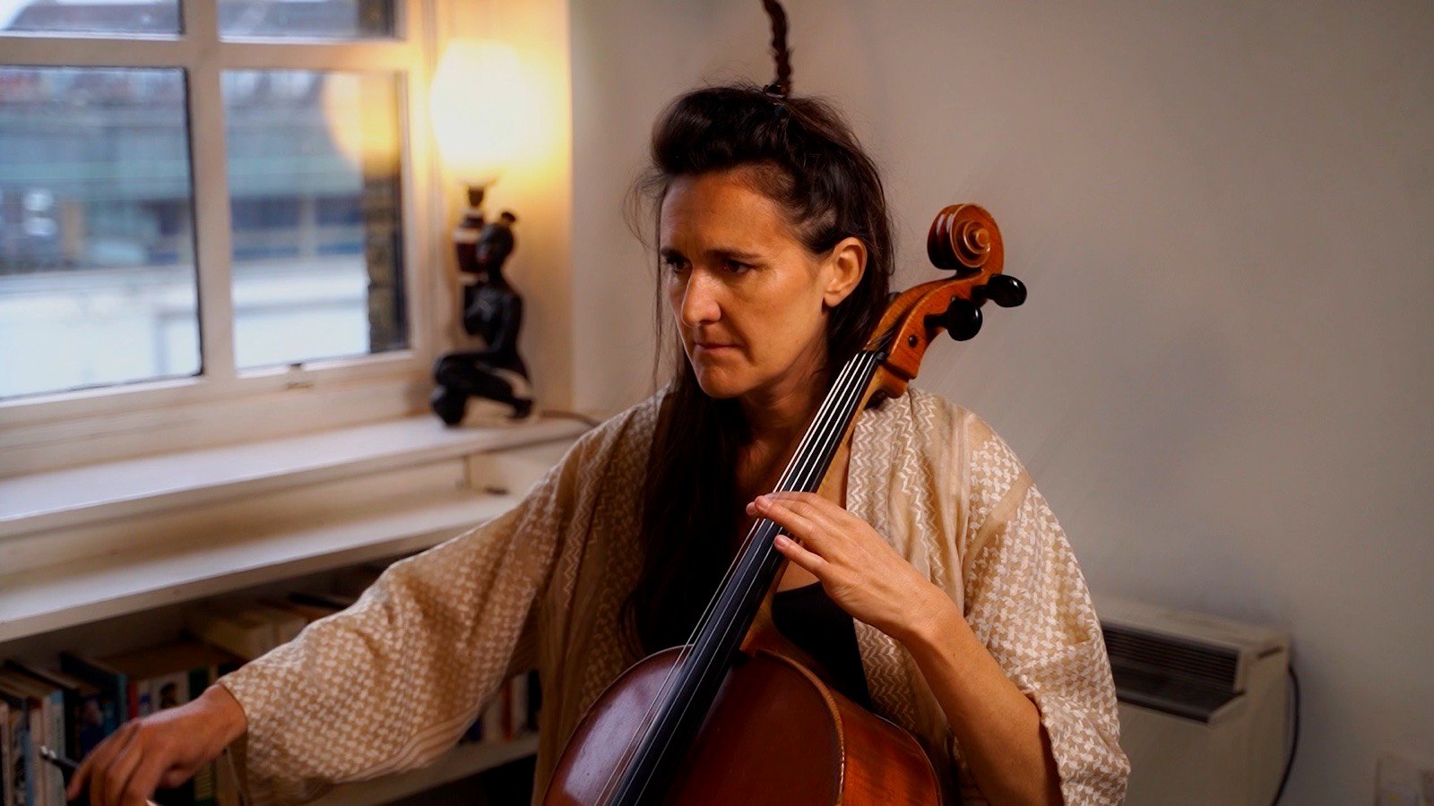 The cellist playing
