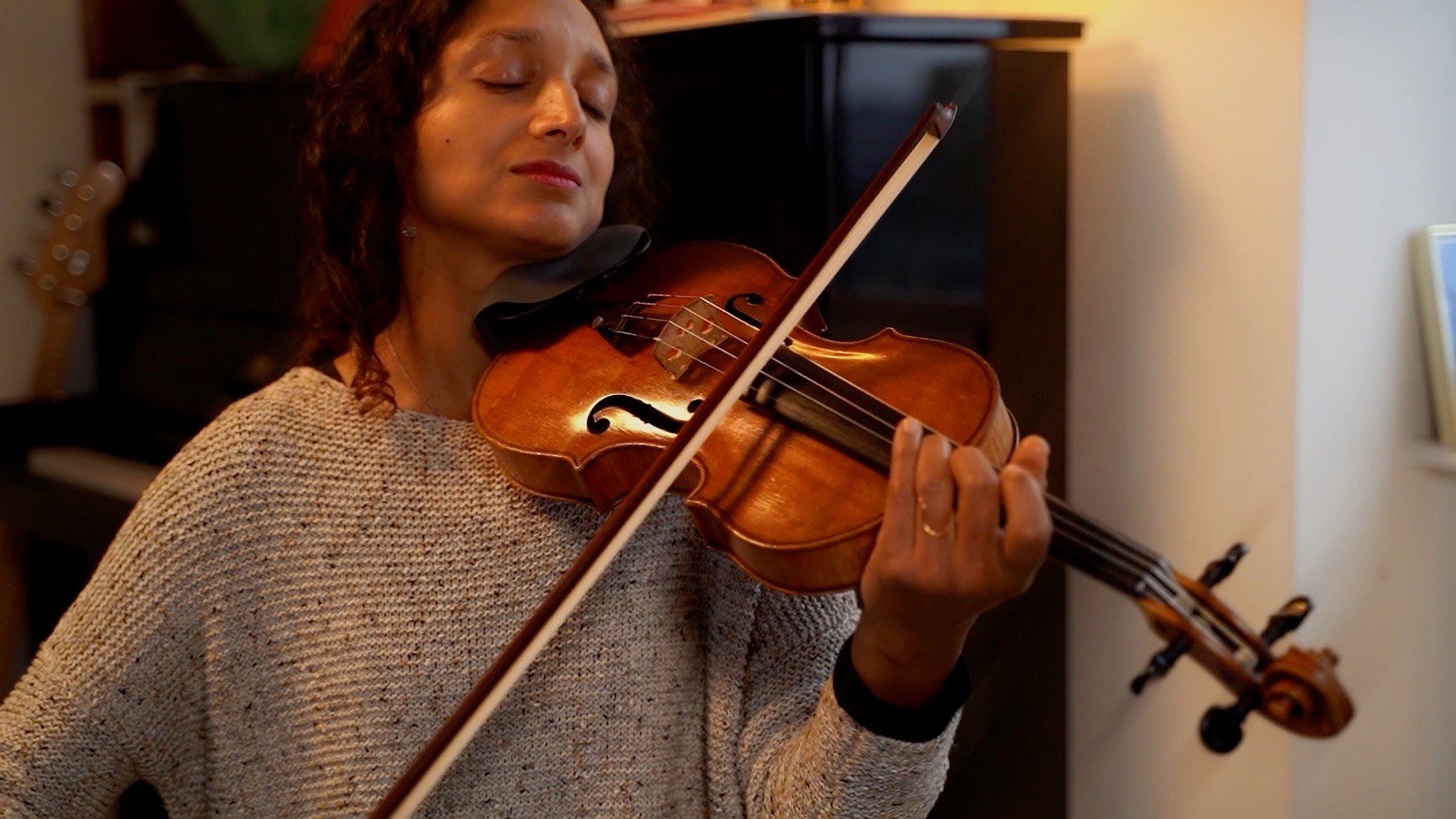 Violin, eyes closed