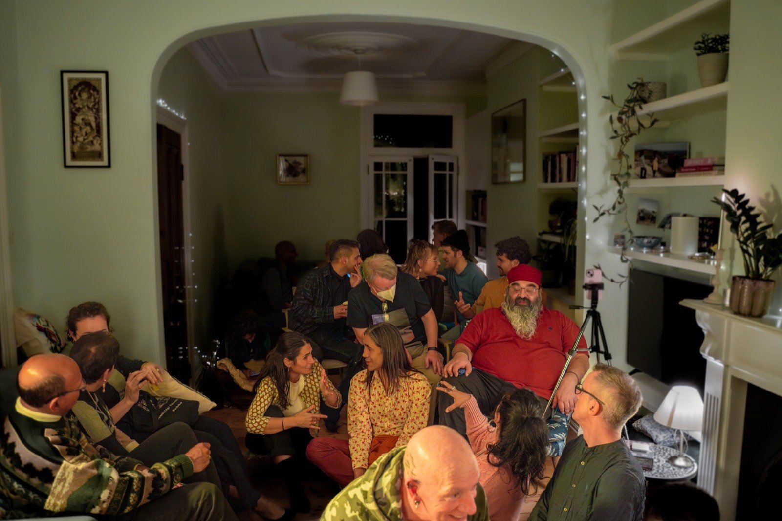 A full room, listeners on every side