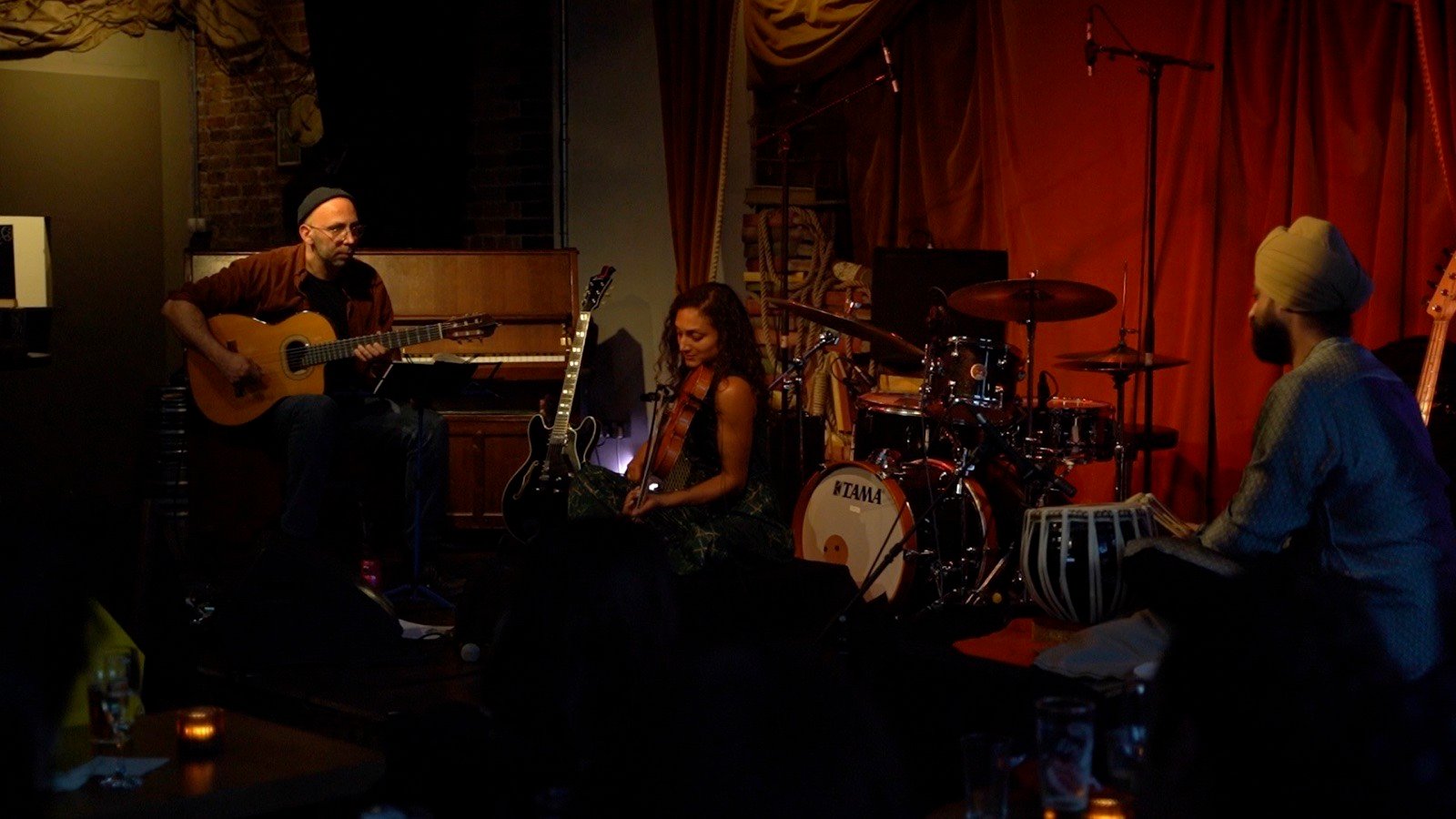 The trio on the red stage