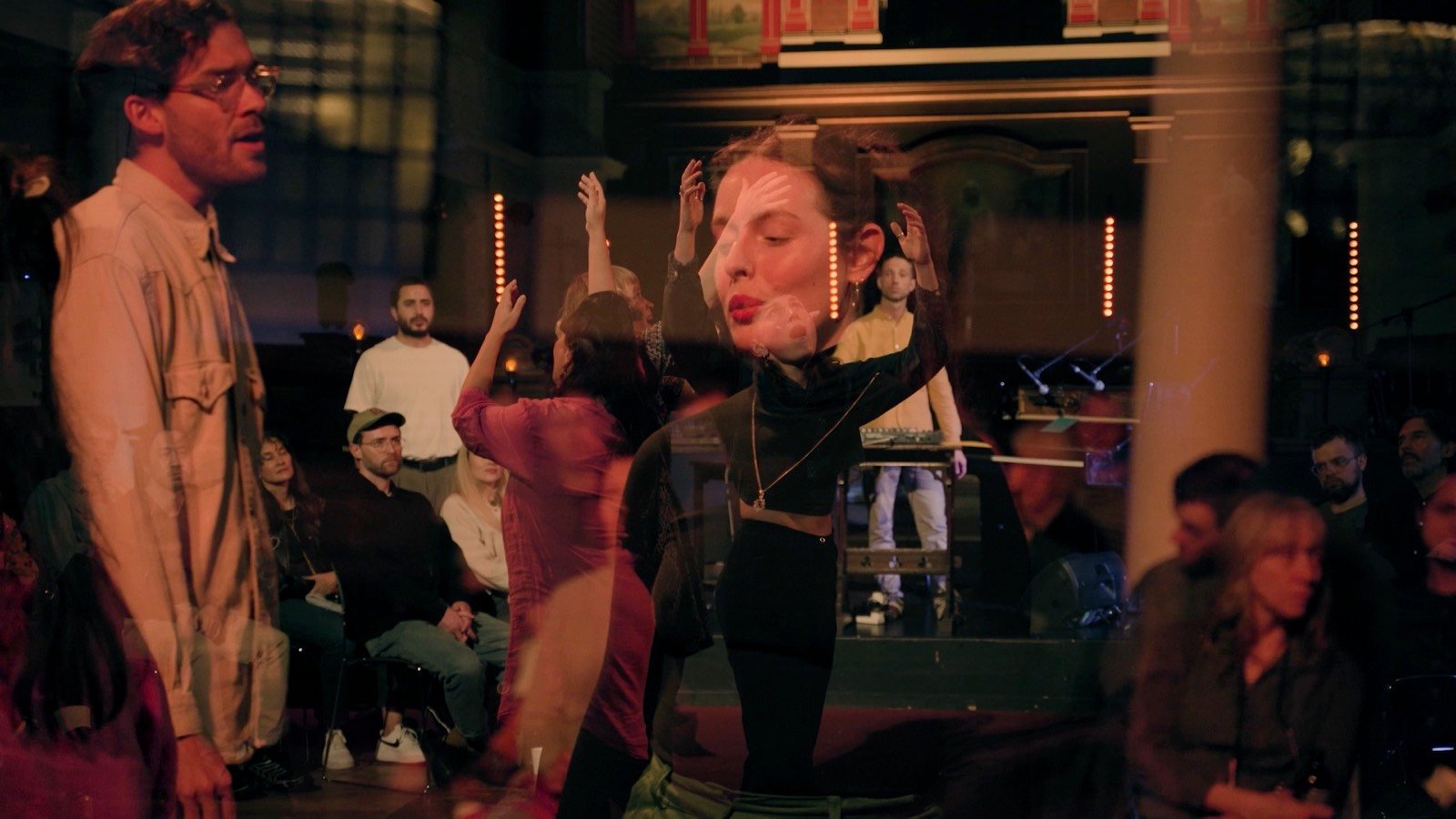 Performers dancing in the middle of the audience