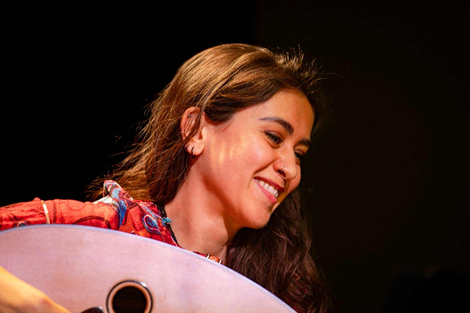 A smile between phrases