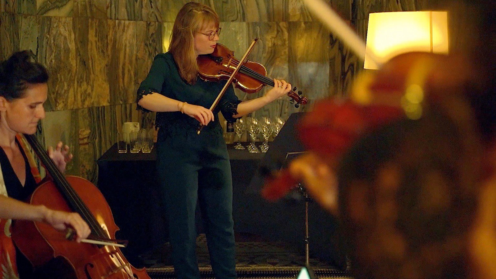 The violinist standing