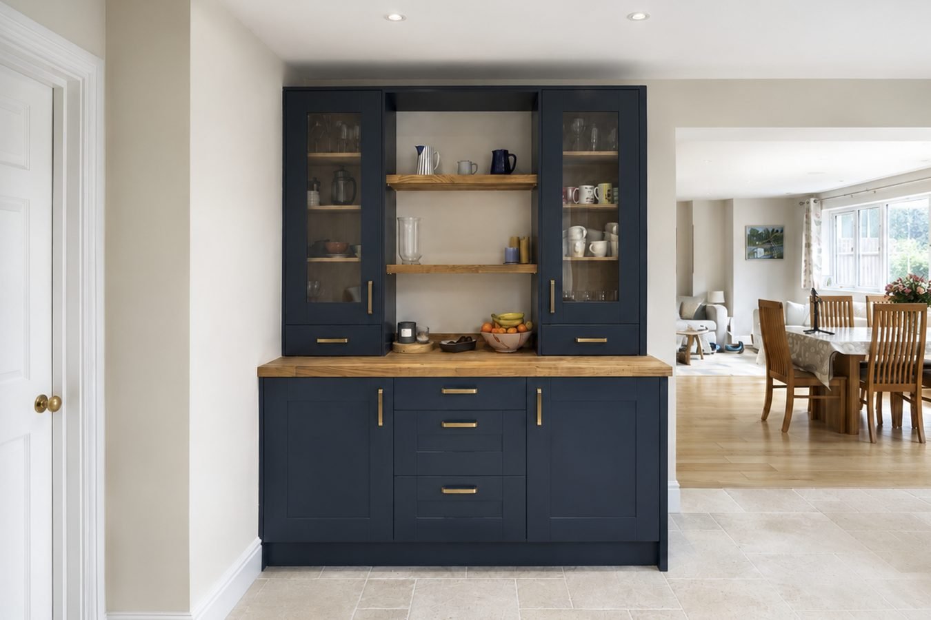 A navy dresser with open wooden shelves in Radlett