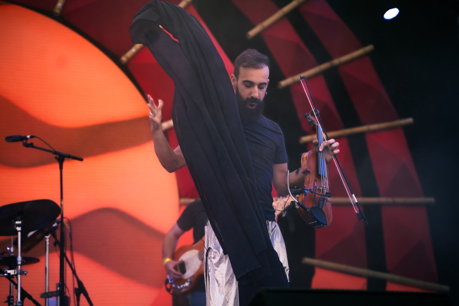 A cloak thrown off mid-set