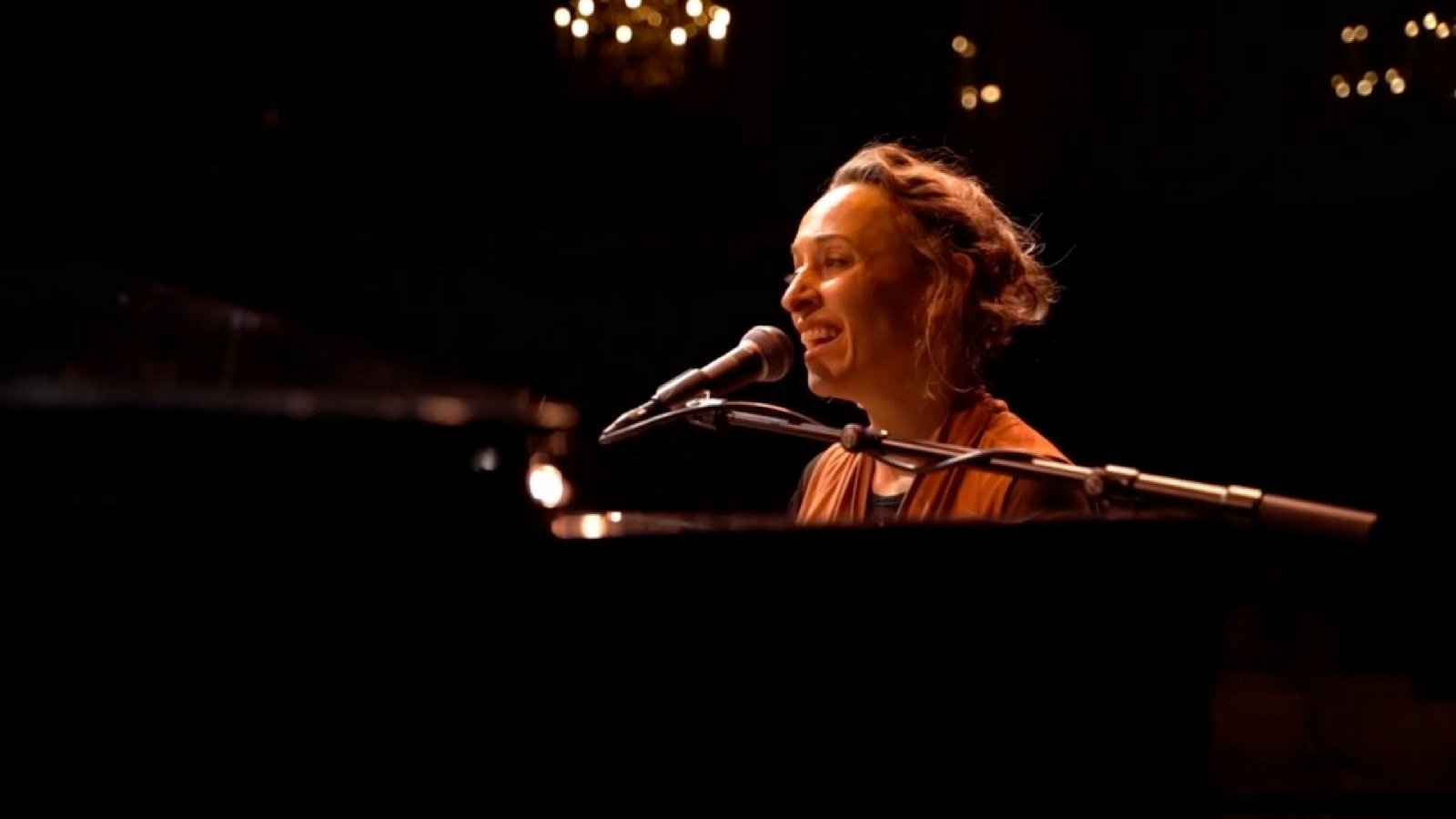 At the piano